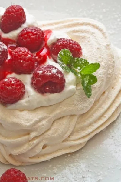 Meringue Hearts with Whipped Cream and Raspberries