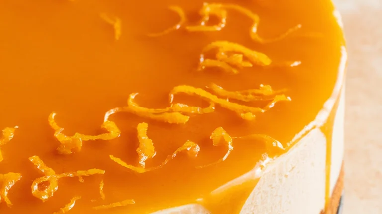 Vanilla Orange Cheesecake with Orange Glaze - Featured